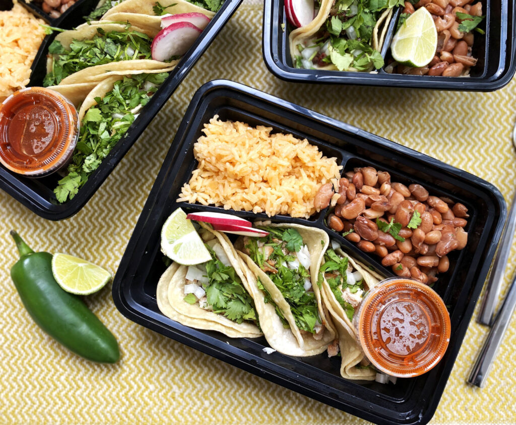 A boxed Mexican-style lunch prepared by Lish for a corporate catering event in Seattle.